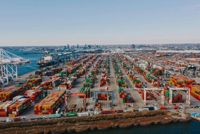port with thousands of containers being brought in and out