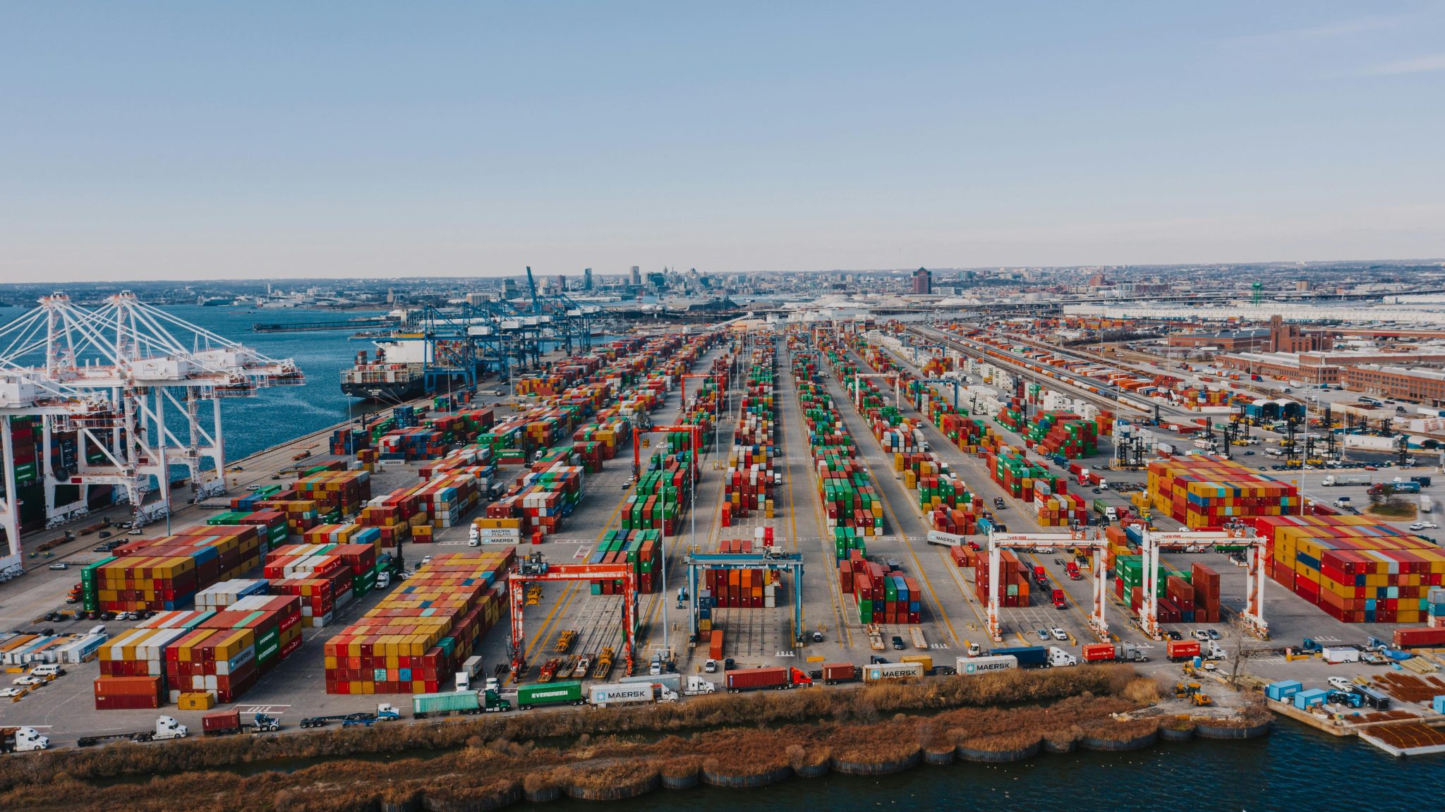 port with thousands of containers being brought in and out